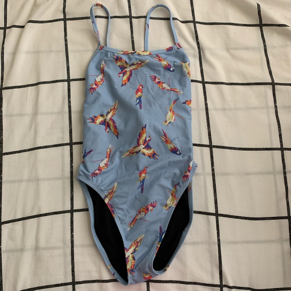 JOLYN PARROT LAVENDER JACKSON ONESIE